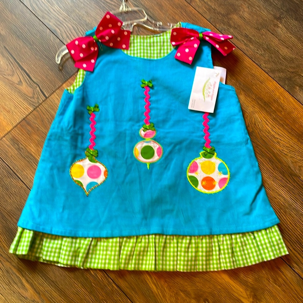 NWT from Wiggles &Giggles Reversible jumper 3T